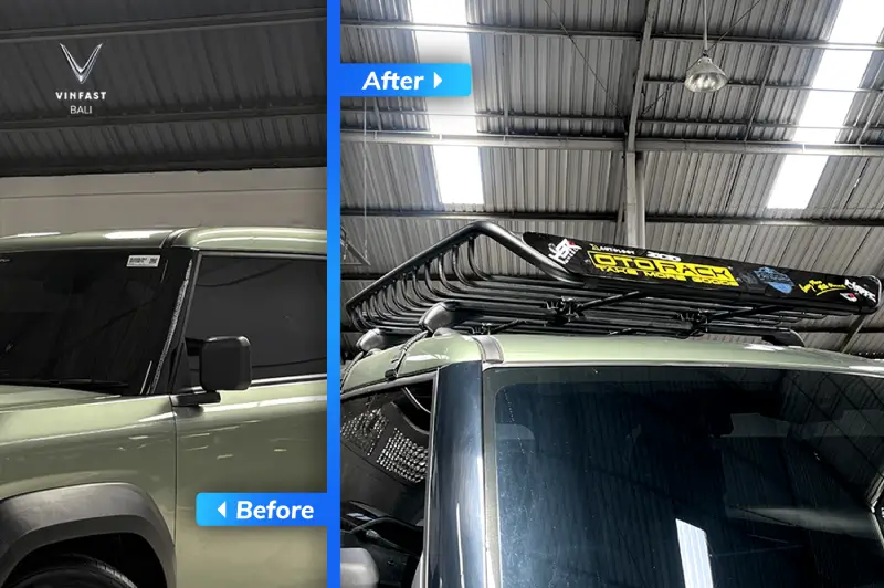 Atap mobil VinFast VF 3 yang telah dipasangi roof rack aluminium berwarna hitam untuk membawa barang tambahan.